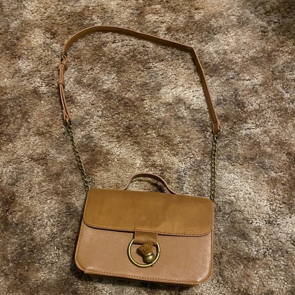 Woman’s brown purse